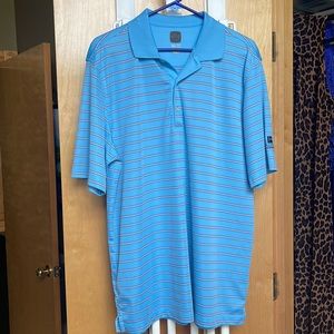 Greg Norman Golf shirt.